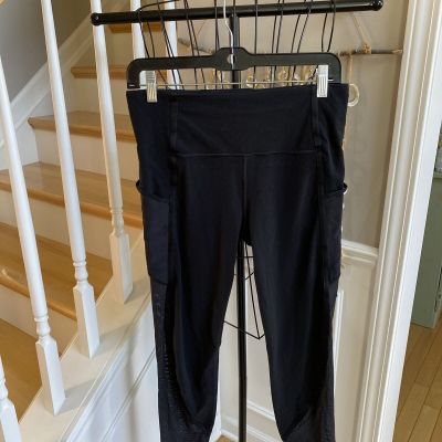 ATHLETA VITALITY STASH POCKET 7/8 TIGHT SZ M BLACK W/ SHEER DETAIL SIDE POCKETS